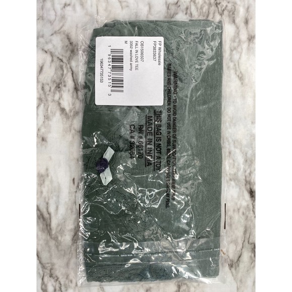 Free People NWT Fall in Love Lace Inset Ruffle Bottom Tee Washed Army Medium New - Picture 9 of 10